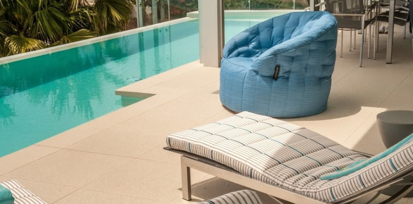 ambient lounge butterfly sofa on a pool patio