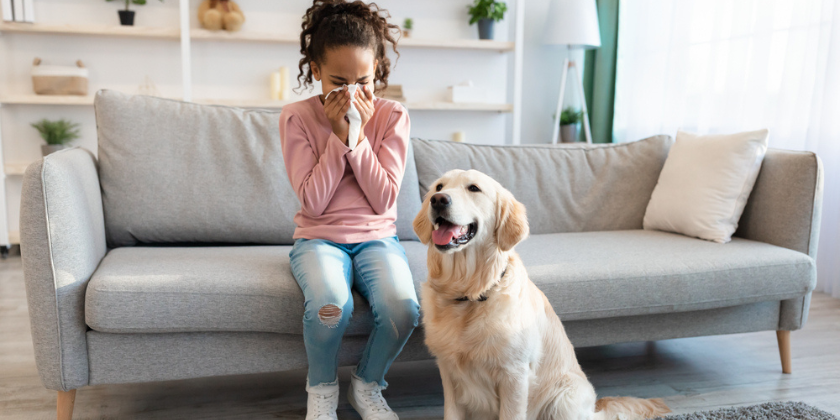 sneezy kid and a dog 